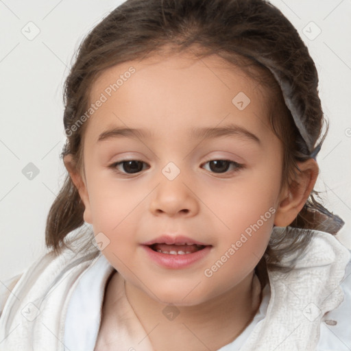 Joyful white child female with medium  brown hair and brown eyes