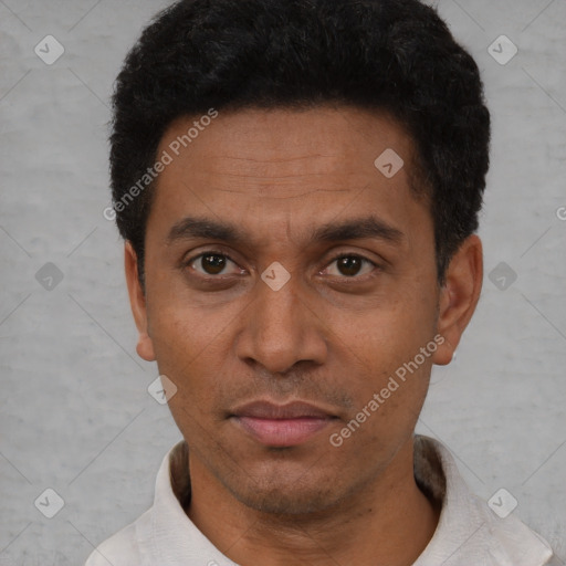 Neutral latino adult male with short  black hair and brown eyes