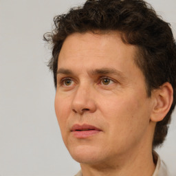 Neutral white adult male with short  brown hair and brown eyes