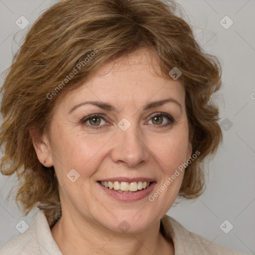 Joyful white adult female with medium  brown hair and blue eyes