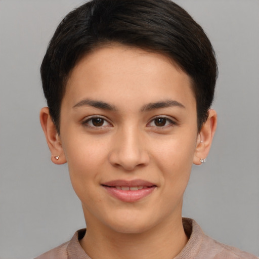 Joyful white young-adult female with short  brown hair and brown eyes