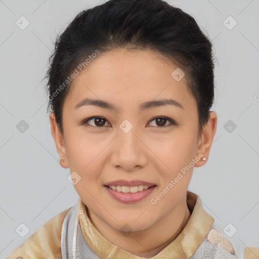 Joyful asian young-adult female with short  brown hair and brown eyes