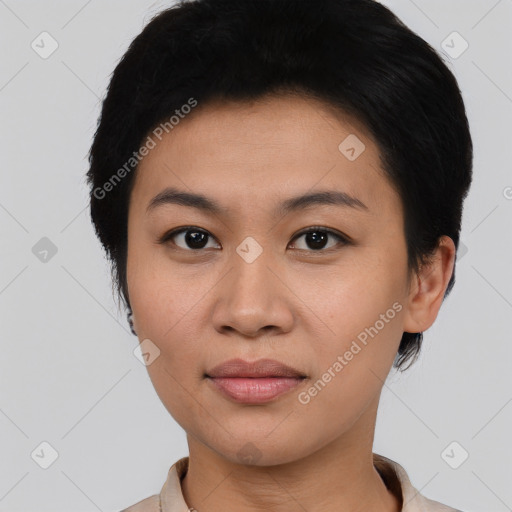 Joyful asian young-adult female with short  black hair and brown eyes