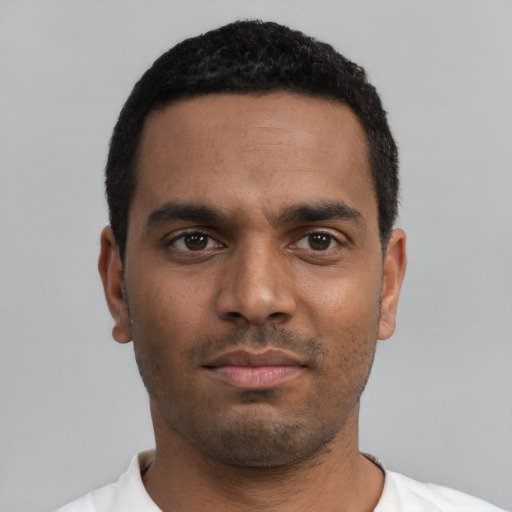 Neutral black young-adult male with short  black hair and brown eyes