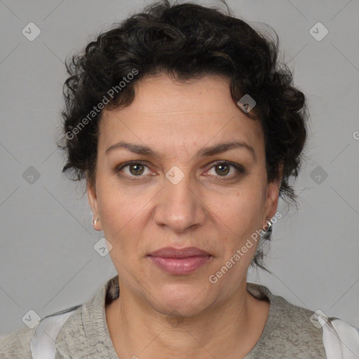 Joyful white adult female with short  brown hair and brown eyes