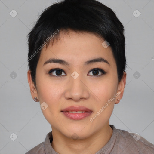 Joyful asian young-adult female with short  black hair and brown eyes