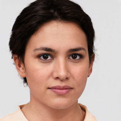 Joyful white young-adult female with medium  brown hair and brown eyes