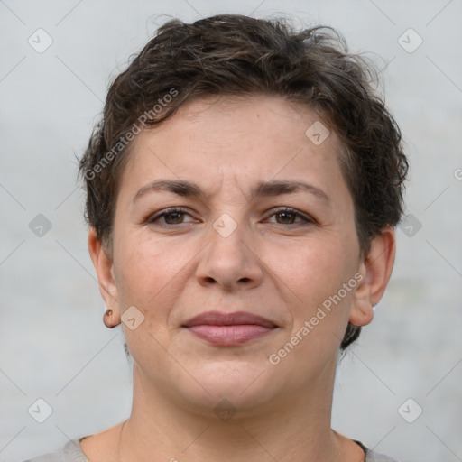 Joyful white adult female with short  brown hair and brown eyes