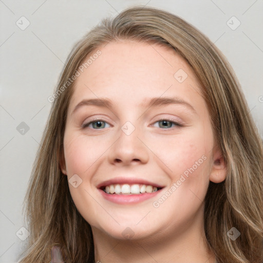 Joyful white young-adult female with long  brown hair and blue eyes