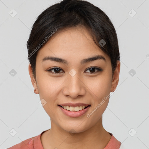 Joyful asian young-adult female with short  brown hair and brown eyes