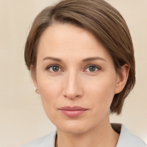 Neutral white young-adult female with medium  brown hair and grey eyes