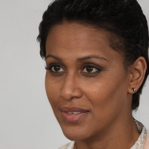 Neutral black young-adult female with short  brown hair and brown eyes