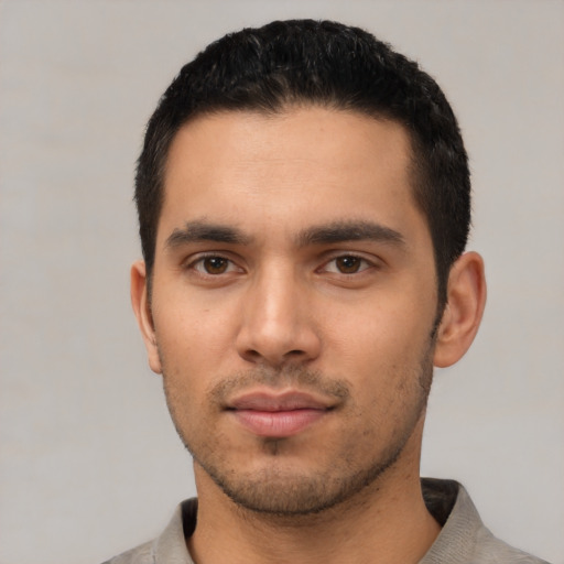 Neutral latino young-adult male with short  black hair and brown eyes