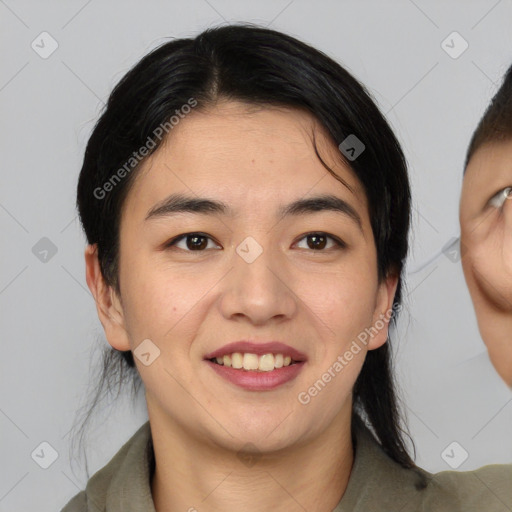 Joyful asian young-adult female with medium  black hair and brown eyes