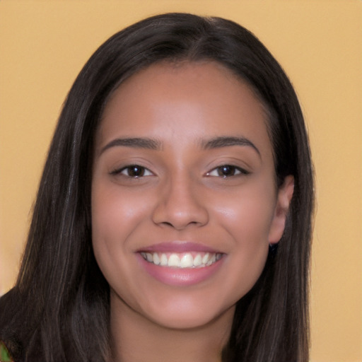 Joyful white young-adult female with long  black hair and brown eyes