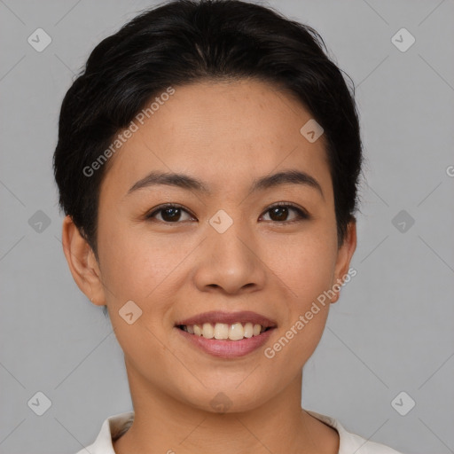 Joyful asian young-adult female with short  brown hair and brown eyes