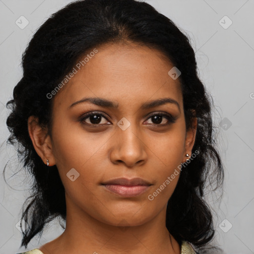 Joyful black young-adult female with medium  black hair and brown eyes