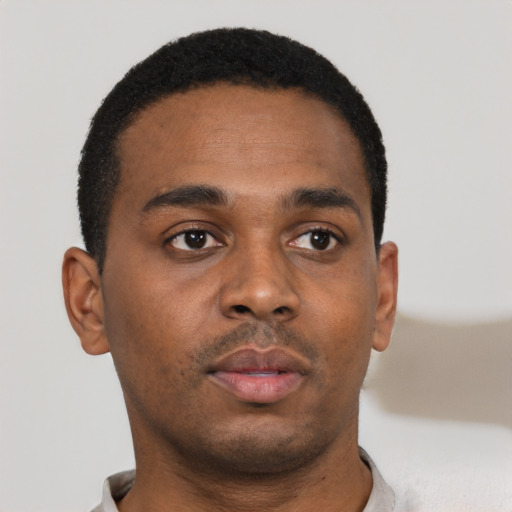 Neutral black young-adult male with short  brown hair and brown eyes