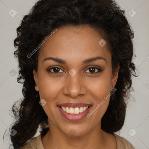 Joyful black young-adult female with medium  brown hair and brown eyes