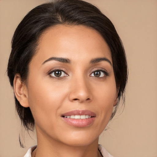 Joyful white young-adult female with medium  brown hair and brown eyes