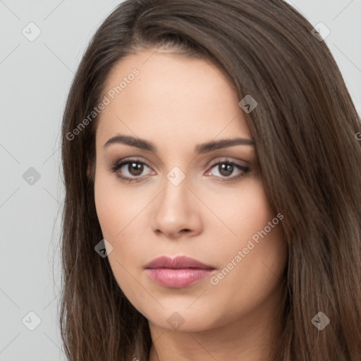 Neutral white young-adult female with long  brown hair and brown eyes