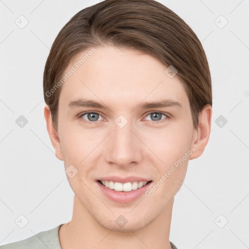 Joyful white young-adult female with short  brown hair and grey eyes