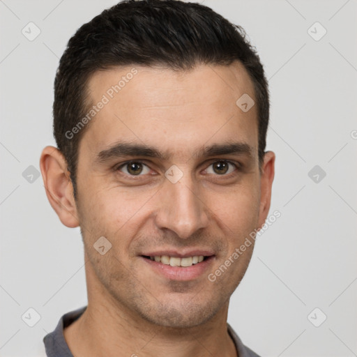 Joyful white young-adult male with short  brown hair and brown eyes