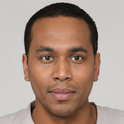 Neutral black young-adult male with short  black hair and brown eyes