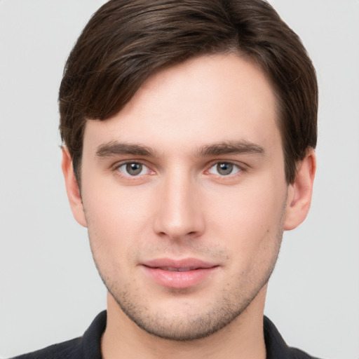 Neutral white young-adult male with short  brown hair and brown eyes