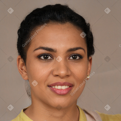 Joyful latino young-adult female with short  brown hair and brown eyes