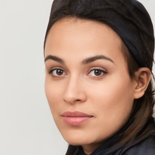 Neutral white young-adult female with long  brown hair and brown eyes