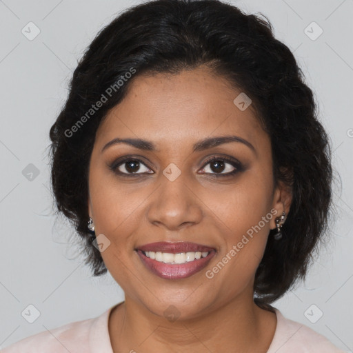 Joyful black young-adult female with medium  brown hair and brown eyes