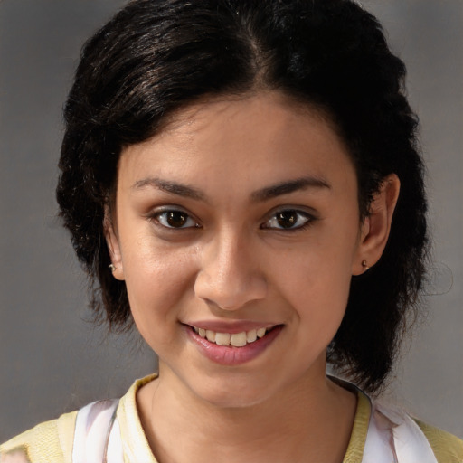 Joyful white young-adult female with medium  brown hair and brown eyes