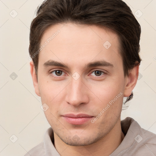 Neutral white young-adult male with short  brown hair and brown eyes