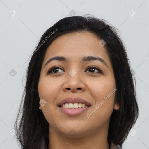 Joyful asian young-adult female with long  brown hair and brown eyes