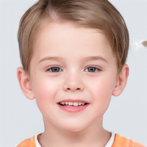 Joyful white child male with short  brown hair and brown eyes