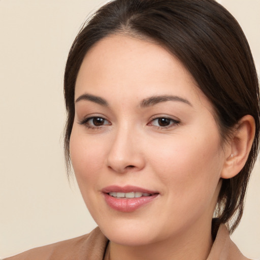 Joyful white young-adult female with medium  brown hair and brown eyes