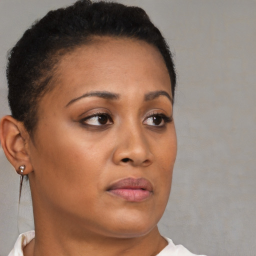 Neutral black young-adult female with short  brown hair and brown eyes