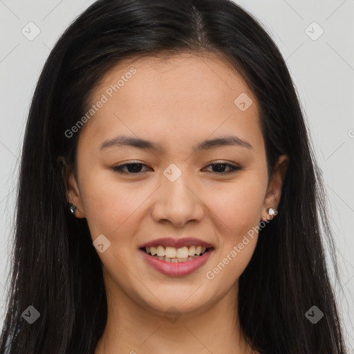 Joyful asian young-adult female with long  brown hair and brown eyes