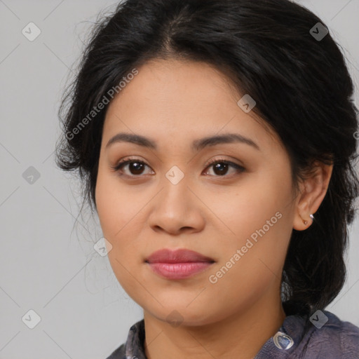 Joyful latino young-adult female with medium  black hair and brown eyes