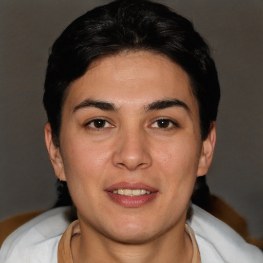 Joyful white young-adult female with short  black hair and brown eyes