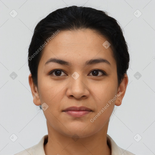 Joyful asian young-adult female with short  black hair and brown eyes