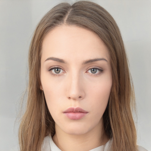 Neutral white young-adult female with long  brown hair and brown eyes