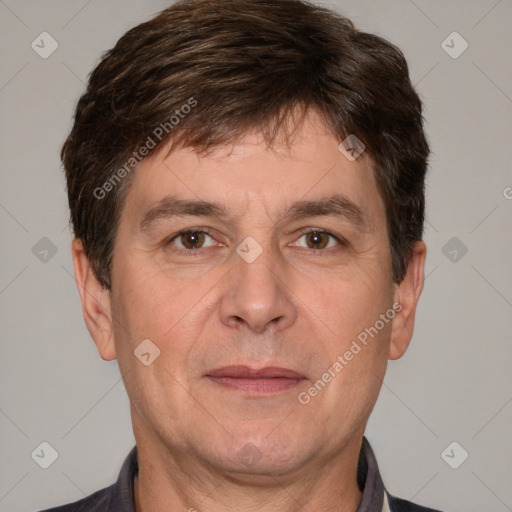 Joyful white adult male with short  brown hair and brown eyes