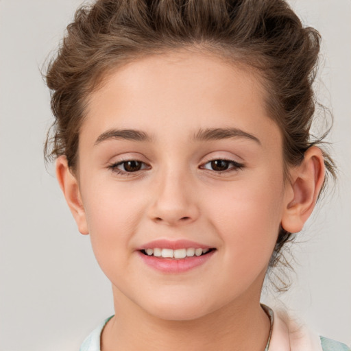 Joyful white child female with medium  brown hair and brown eyes