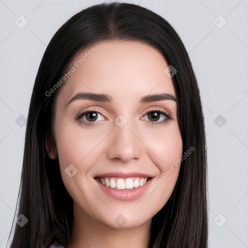 Joyful white young-adult female with long  black hair and brown eyes