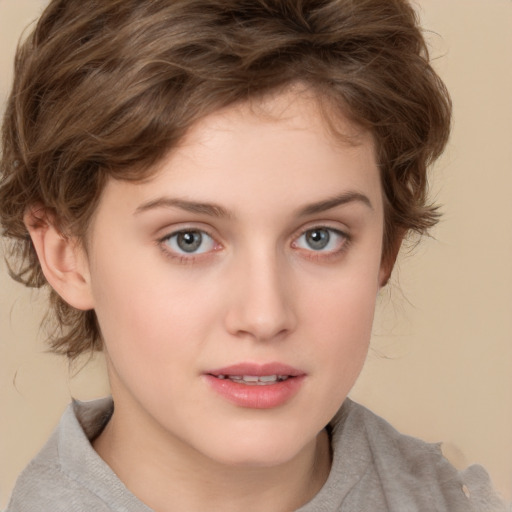 Joyful white child female with medium  brown hair and grey eyes