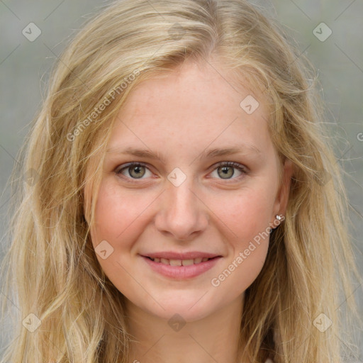 Joyful white young-adult female with medium  brown hair and blue eyes