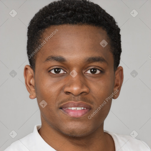 Joyful black young-adult male with short  brown hair and brown eyes