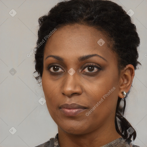 Joyful black young-adult female with medium  black hair and brown eyes